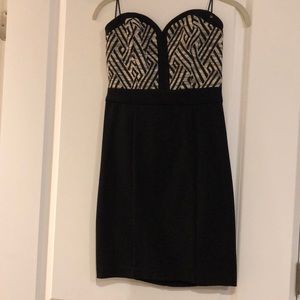 Strapless black dress with printed bodice